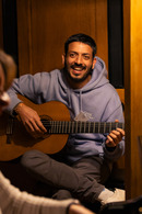 Prateek plays guitar